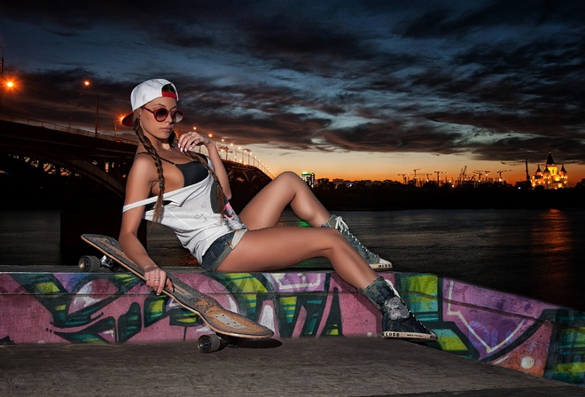 women, baseball caps, bikini top, T-shirt, tanned, shoes, jean shorts, sunglasses, women with glasses, pigtails, skateboard, sitting