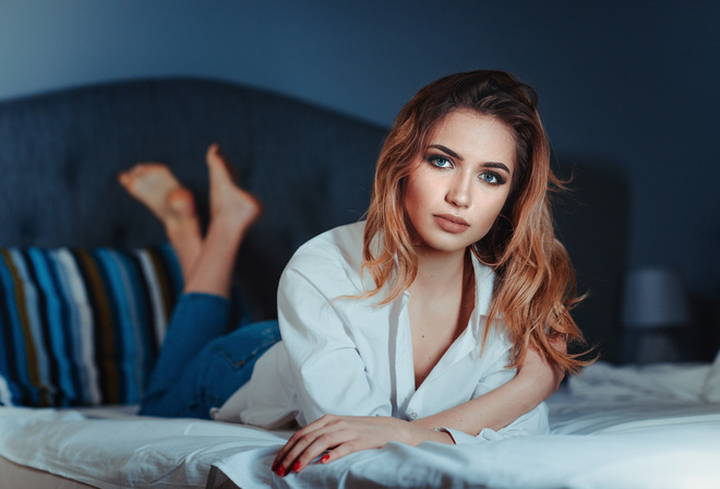 women, redhead, jeans, red nails, shirt, in bed, blue eyes, depth of field, lying on front