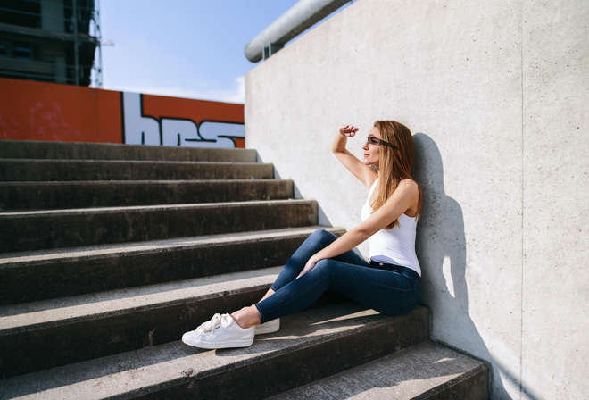 women, blonde, jeans, sneakers, sitting, stairs, women outdoors, looking away, shadow