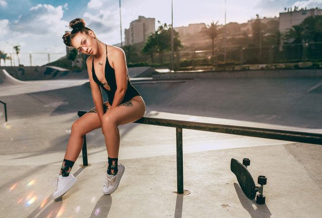 women, hairbun, tanned, socks, tattoo, women with glasses, one-piece swimsuit, sneakers, skateboard, sitting, women outdoors