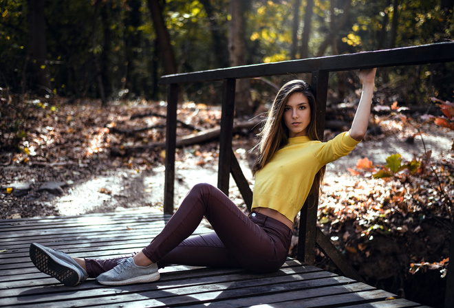 women, pants, bridge, portrait, women outdoors, sitting, sneakers, trees, nipples through clothing