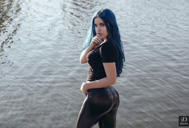 women, blue hair, black clothing, finger on lips, long hair, pants, water, women outdoors, dyed hair