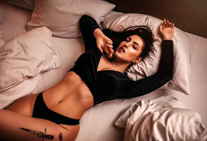 women, brunette, ribs, black panties, top view, in bed, pillow, lying on back, tattoo, eyeliner, necklace