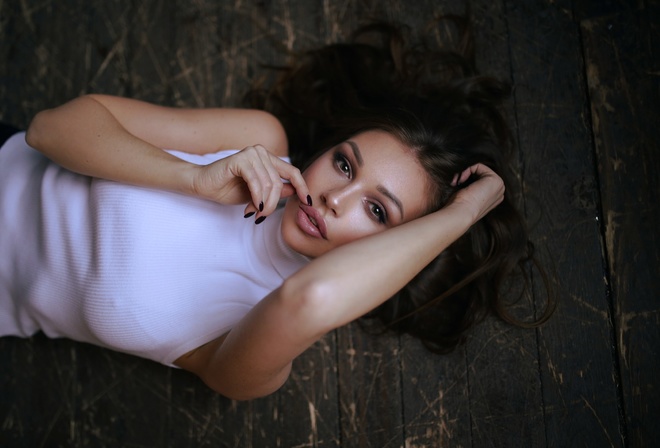 women, top view, on the floor, juicy lips, painted nails, portrait, wooden floor, pink lipstick