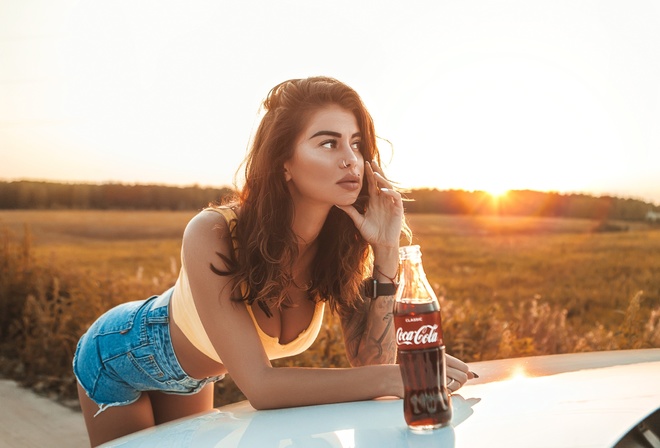 women, brunette, women outdoors, women with cars, nose ring, jean shorts, bottles, Coca-Cola, piercing, looking away, juicy lips, sunset, tank top, tattoo, watch