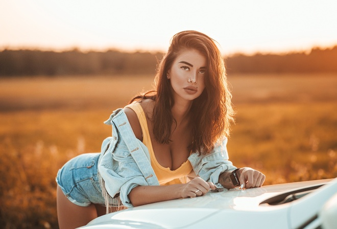 women, brunette, women outdoors, women with cars, tattoo, denim, tank top, jean shorts, sunset, nose ring, piercing, watch, juicy lips