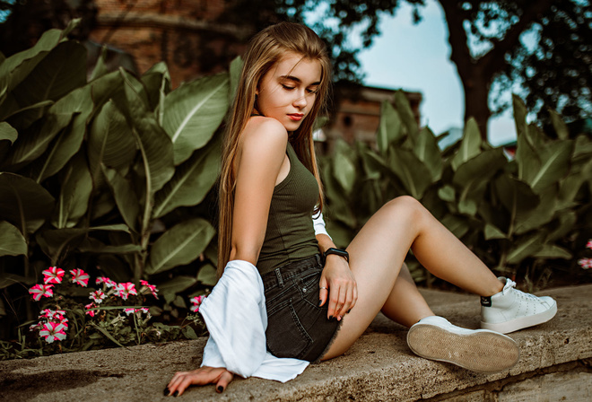 women, long hair, red lipstick, sneakers, jean shorts, sitting, plants, black nails, trees