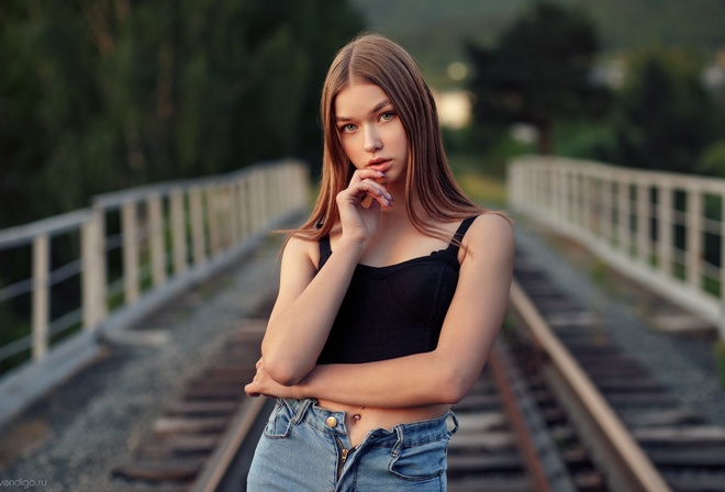 women, pierced navel, finger on lips, railway, women outdoors, zipper, denim, portrait