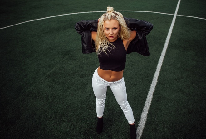 women, soccer field, synthetic grass, jeans, belly, blonde, black jackets, leather jackets, armpits