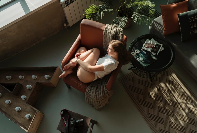 women, white t-shirt, white panties, women indoors, top view, window, light bulb, ass, brunette, armchair, camera, magazine, plants, couch