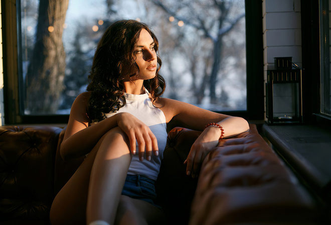 brunette, women, window, model, jean shorts, T-shirt, sitting, couch, trees