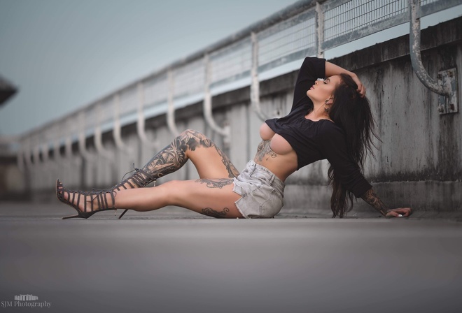 Simon Morton, brunette, women, model, women outdoors, tattoo, underboob, jean shorts, blouse, sitting, bridge