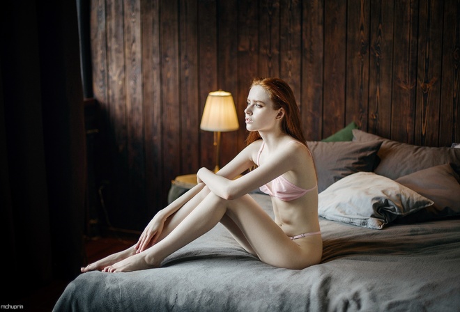 Maksim Chuprin, model, women, redhead, women indoors, in bed, bed, pink lingerie, lingerie, hips, pink bra, pink panties, lamp