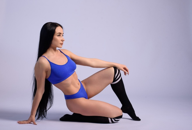 brunette, model, women, studio, blue tops, sports bra, fitness model, blue panties, women indoors, white background, simple background, ass, hips, long hair, black socks, striped socks