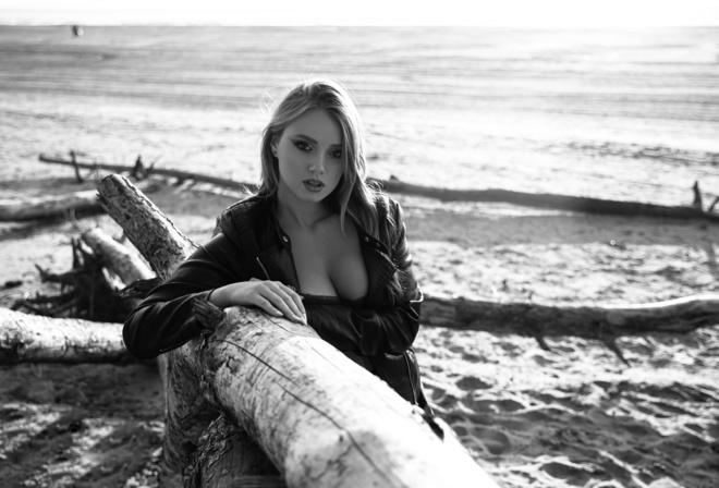 black jacket, leather jacket, women outdoors, blonde, model, women, neckline, beautiful, looking at viewer, beach, monochrome