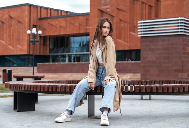 jeans, white tops, brunette, sitting, public, , women outdoors, model, sneakers, urban, trench coat