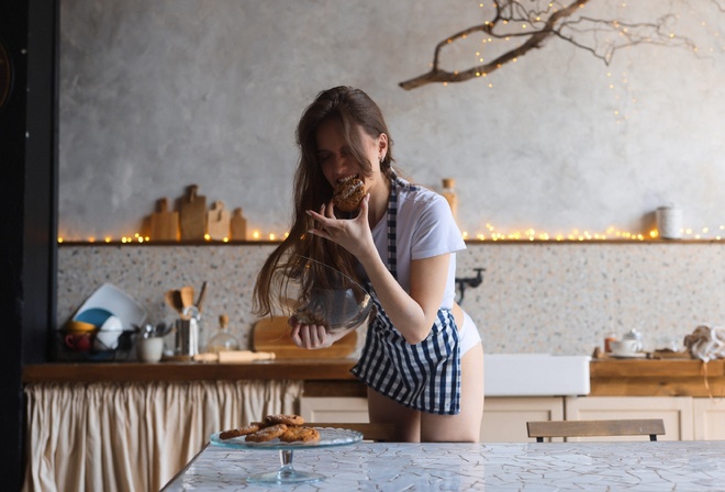 brunette, ass, , women indoors, white panties, hips, model, kitchen, chair, table, ass, cookies, white t-shirt, biting, T-shirt, dishes, teeth, tablecloths, apron, long hair, bent over, lights