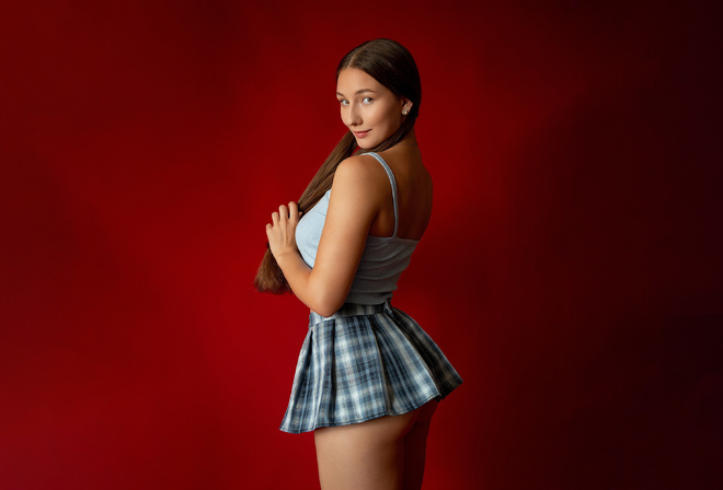 Evgeniy Krestyanov, ass, miniskirt, brunette, women indoors, studio, , model, red background, blue tops, long hair