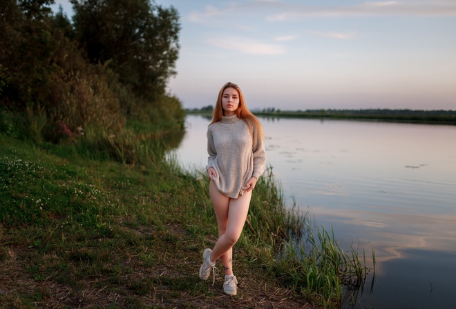 women outdoors, , lake, redhead, sky, legs, nature, model, grass, trees, clouds, tattoo, , women, sneakers, water, reflection, sweater, arms crossed