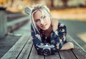 women, blonde, Lods Franck, portrait, smiling, lying on front, depth of field, camera, blue eyes