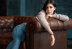 women, couch, portrait, jeans, sweater, sitting