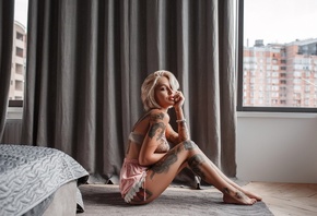 women, blonde, tanned, sitting, tattoo, window, on the floor, bed, sideboob, finger on lips, lingerie