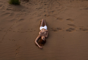 women, sand, women outdoors, top view, jean shorts, hands on boobs, coverin ...