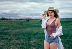 women, hat, jean shorts, women outdoors, sky, clouds, hoop earrings, glasses