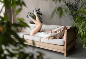 women, blonde, white clothing, women indoors, couch, white socks, plants, window, closed eyes, feet in the air