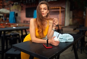 Dmitry Shulgin, women, model, blonde, women indoors, restaurant, yellow dress, dress, cellphone, smartphone, table, watch, bent over