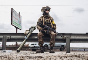 Ukrainian soldier, road, Irpin, Ukraine