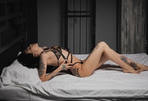 women, in bed, black lingerie, tattoo, women indoors, closed eyes, see-through bra, belly, handcuffs, handcuffed