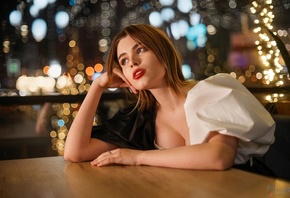 Maxim Matveev, , brunette, model, table, dress, sitting, neckline, red lipstick, indoors, bokeh, nose ring, pierced nose