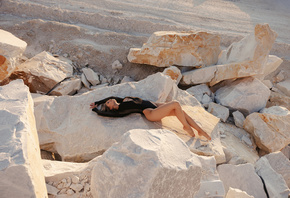 , women outdoors, hips, blonde, bodysuit, sky, clouds, rocks, model, black bodysuit, women, ass, nature, lying on back, closed eyes