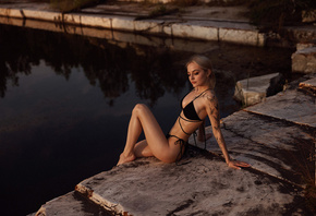 Ivan Vedernikov, ass, women outdoors, blonde, tattoo, black bikini, sitting, women, closed eyes, water, , makeup, red lipstick