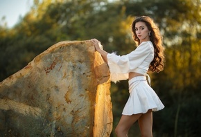 Dmitry Shulgin, white miniskirt, brunette, rocks, women outdoors, women, , trees, standing, sky, white blouse, model, long hair, miniskirt, white clothing, looking at viewer, red lipstick