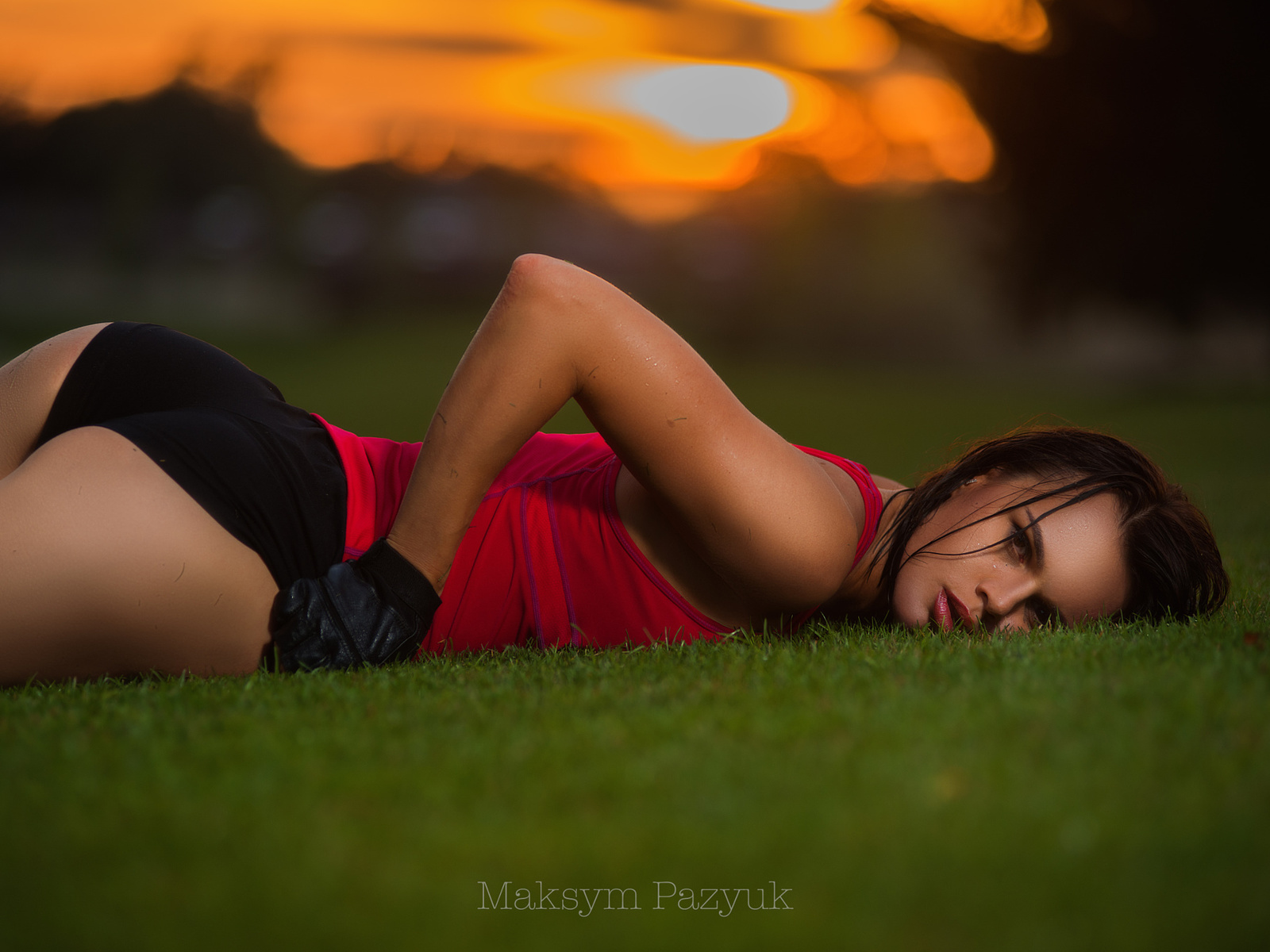 women, model, brunette, ass, shorts, gloves, women outdoors, sunset, grass, looking at viewer, wet hair, wet body, water drops, portrait