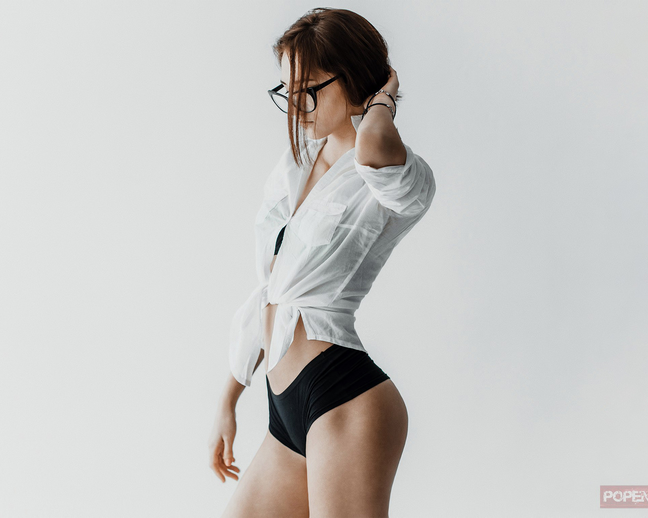 women, portrait, short shorts, short, skirt, belly, brunette, ass, women with glasses, glasses, see-through clothing, hands on head, simple background, white background, andrey popenko