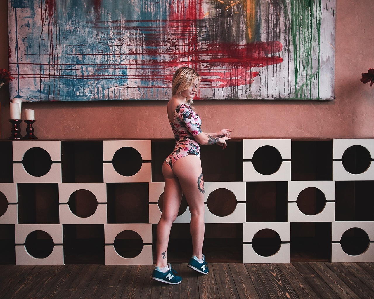 liuba meniaeva, women, blonde, ass, back, tattoos, sneakers, one-piece, wall, candles, flowers, socks, wooden surface, brunette, legs, 