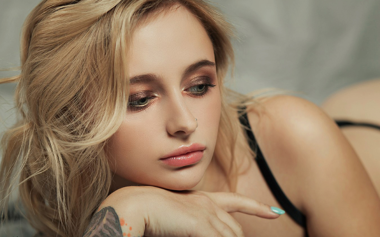 liuba meniaeva, women, blonde, tattoo, black lingerie, face, makeup, painted nails, depth of field, looking away, pierced nose