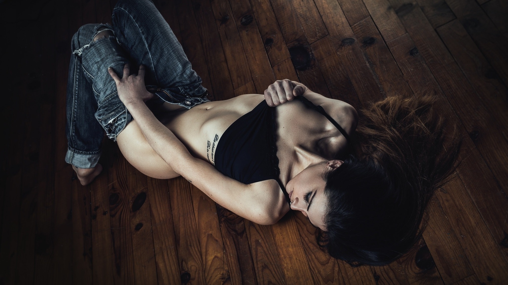 women, brunette, pants down, pants, jeans, belly, wooden surface, tattoo, black bras, closed eyes, torn jeans, lying on back