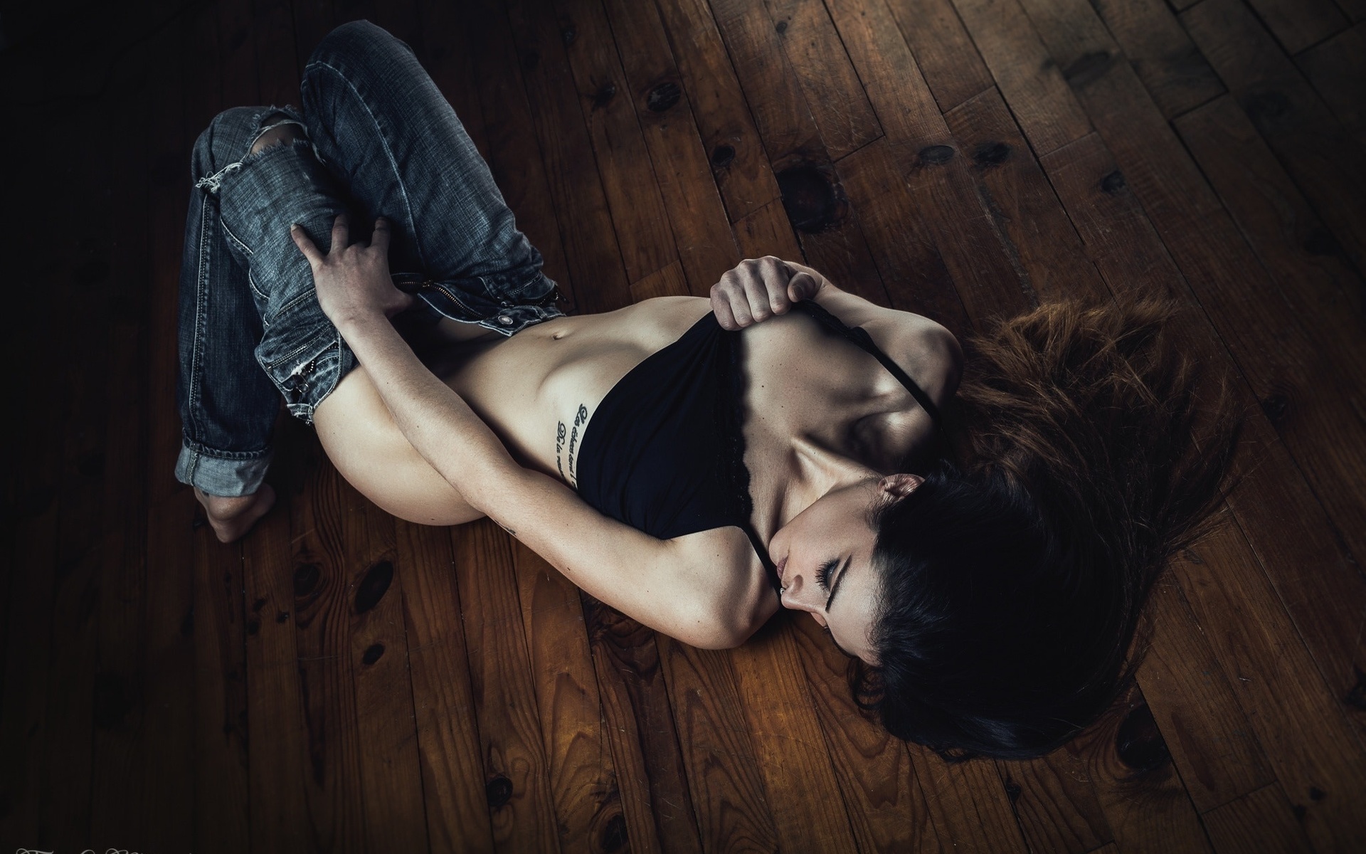 women, brunette, pants down, pants, jeans, belly, wooden surface, tattoo, black bras, closed eyes, torn jeans, lying on back