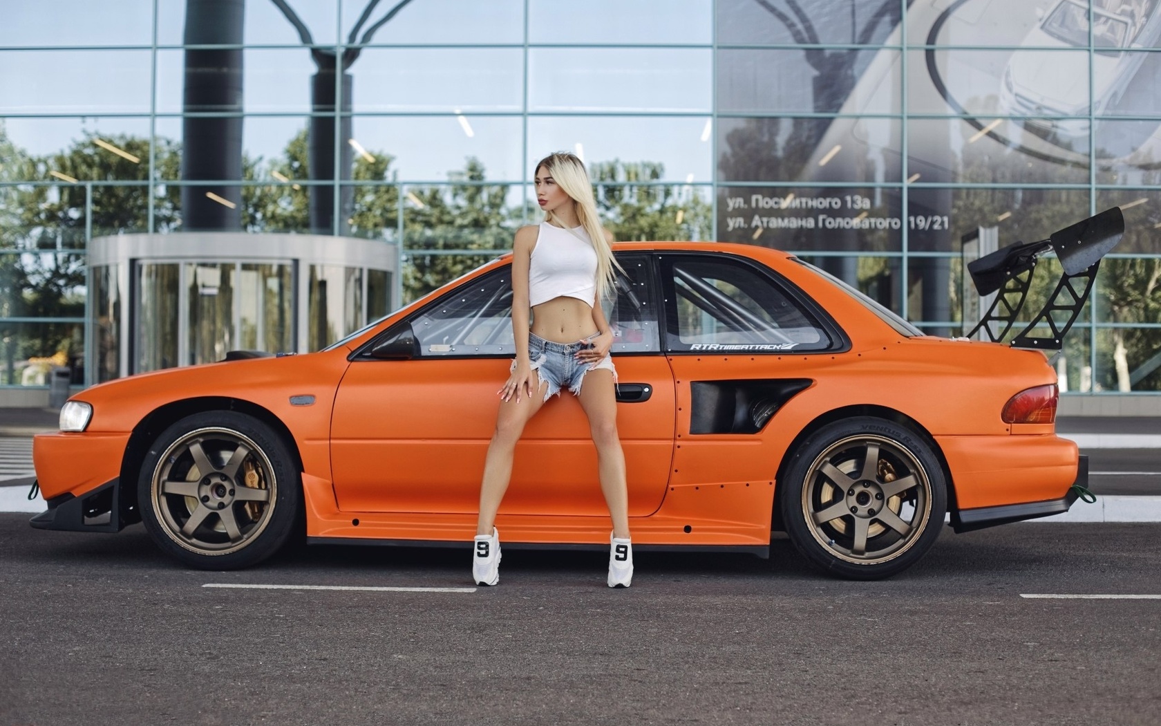 women, blonde, car, tanned, jean shorts, sneakers, looking away, belly