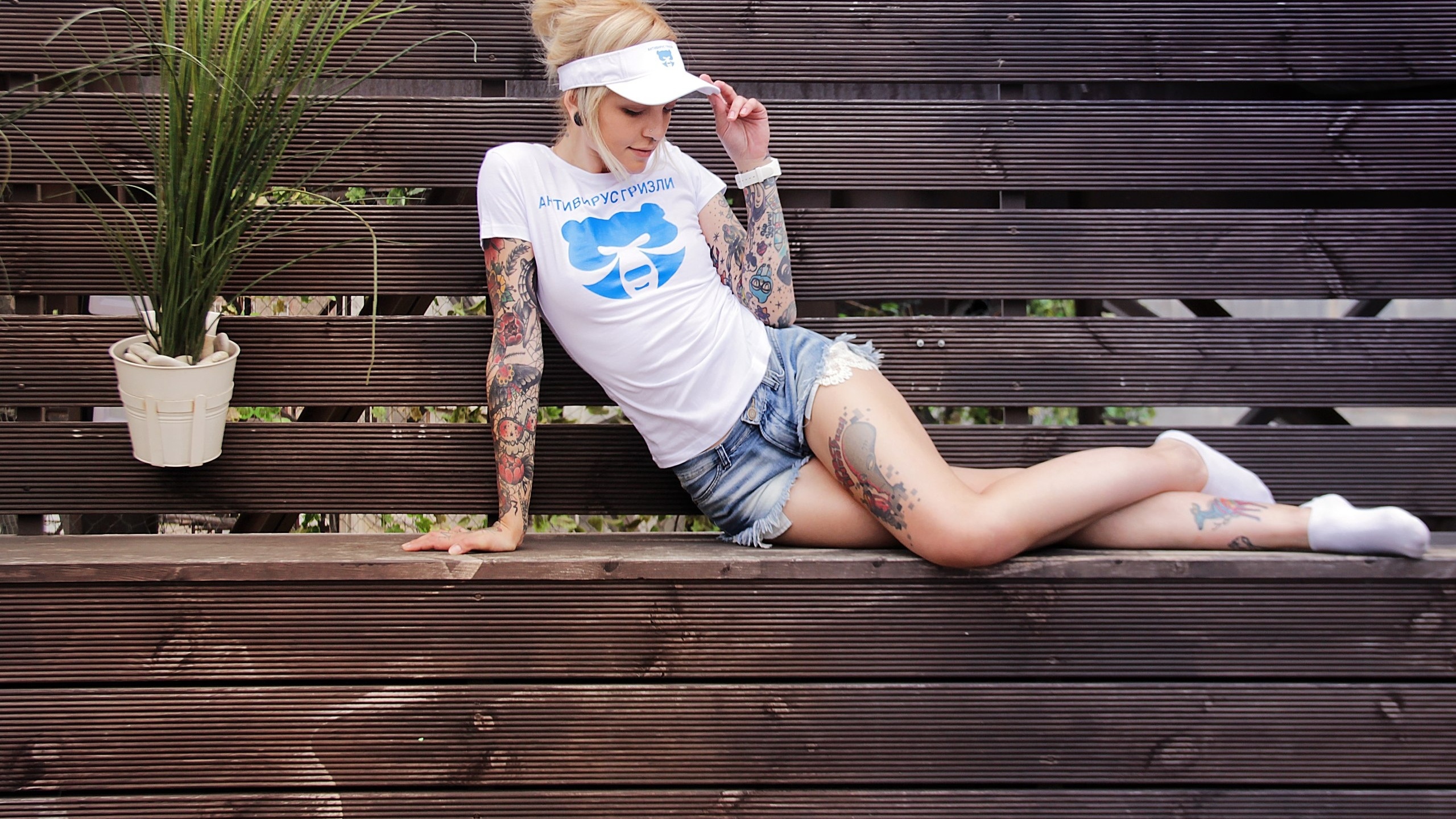 women, blonde, nose rings, tanned, t-shirt, tattoo, jean shorts, socks, portrait, plants