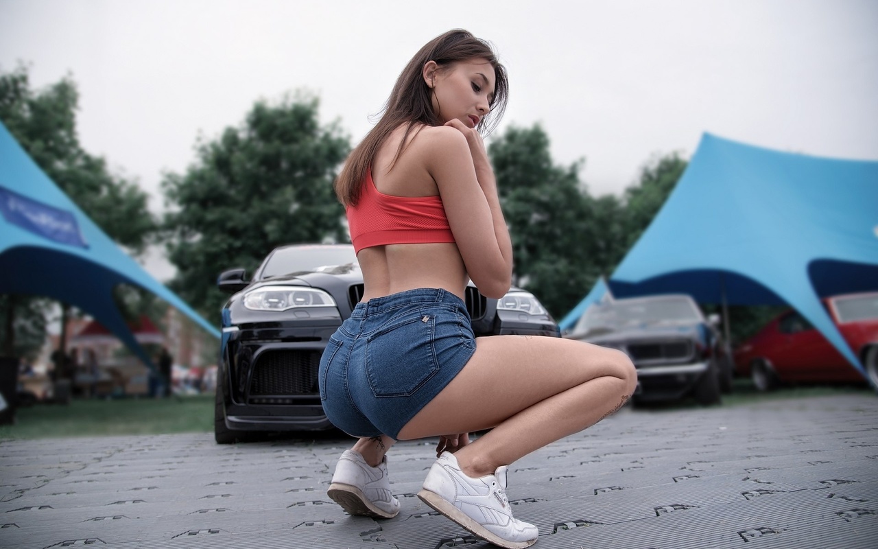 women, tanned, jean shorts, red tops, tattoo, car, women outdoors, ass, sneakers, squatting