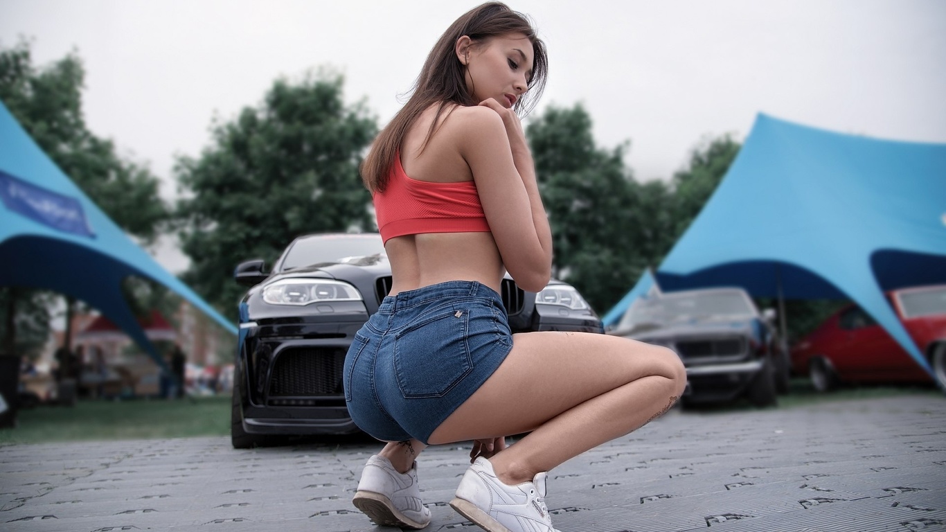 women, tanned, jean shorts, red tops, tattoo, car, women outdoors, ass, sneakers, squatting