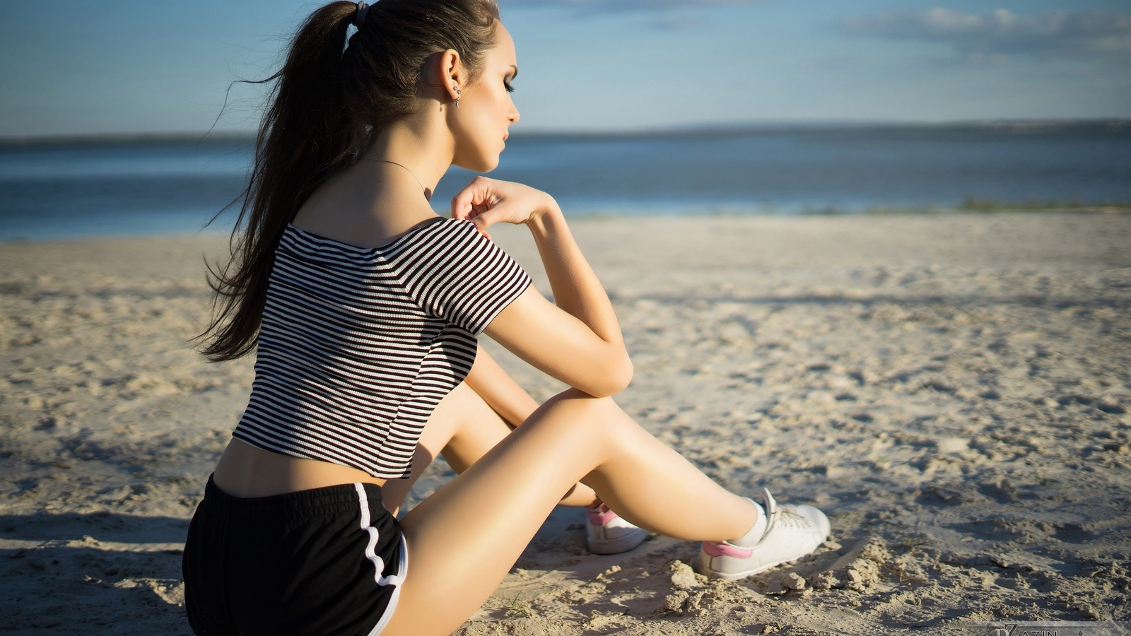 women, sitting, sneakers, sand, sea, shorts, short shorts, women outdoors, depth of field, 