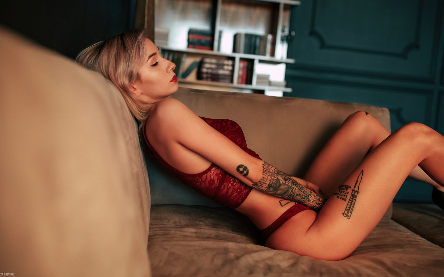 women, blonde, closed eyes, tanned, couch, red lipstick, red lingerie, tattoo