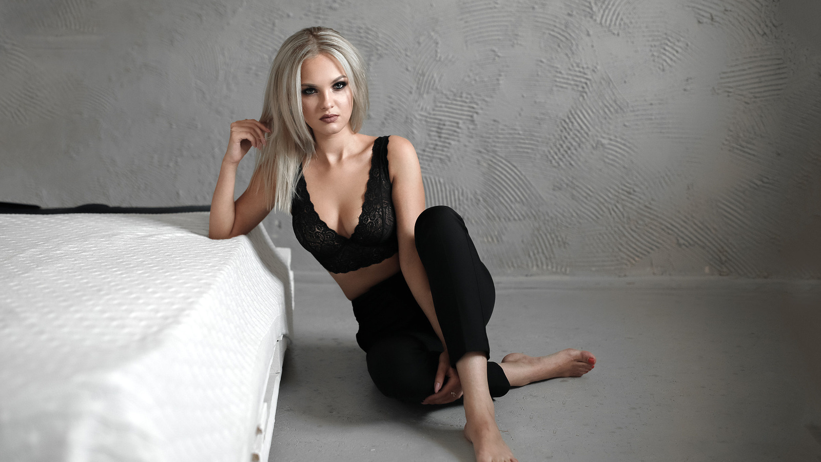 women, blonde, bed, pants, red nails, lingerie, black clothing, sitting, on the floor, brunette, wall