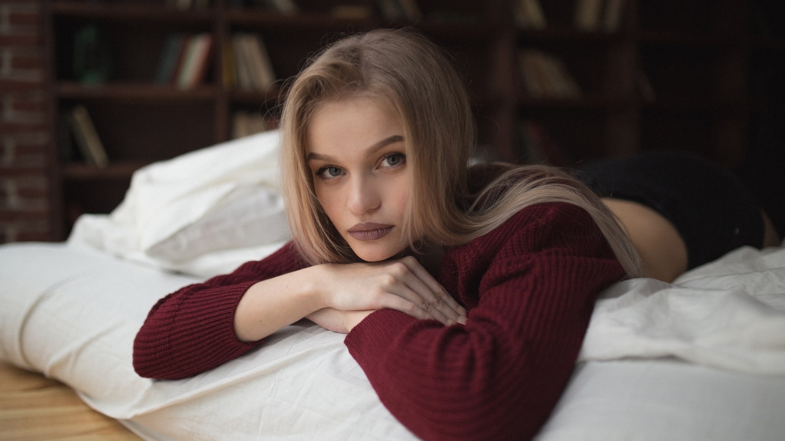 women, blonde, portrait, depth of field, lying on front, books, face